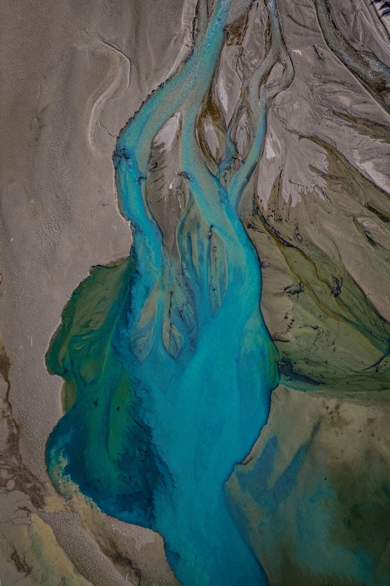 Turquoise river delta from above